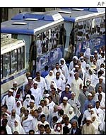 Pilgrims and their buses in Mecca