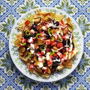 Fried aubergine, tomato and chilli salad with toasted pitta