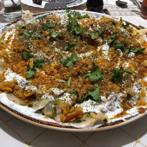 Exquisite Afghan Cuisine: Ashak - Dumplings in Beef Sauce with Garlic Yoghurt