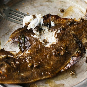 Whole flounder with burnt butter, capers and sage
